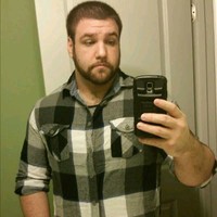 Testing Employee John Kamen's profile photo