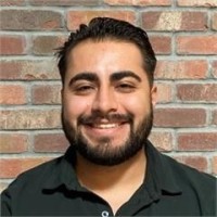 TravelBank Employee Kevin Munoz's profile photo