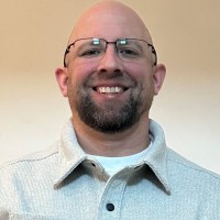 AutoComplete Employee Adam Benner's profile photo