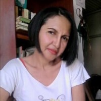 Particular. Employee Carina Mendoza's profile photo