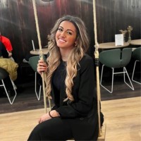 Double Caring Employee Amira Douairi's profile photo