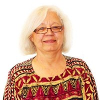 Minneapolis Area REALTORS® Employee Ione Bullis's profile photo