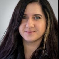 AMINA Bank Employee Tally Hall's profile photo