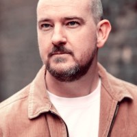 Then we design. Employee Baz Markham's profile photo