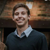Focused Employee Agustín Rodríguez's profile photo