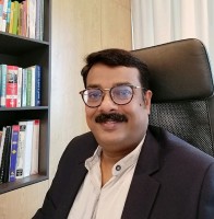 Edinburgh Business School Employee Praveen Nair's profile photo