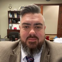Justin Brewster Email & Phone Number