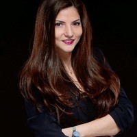 Curly Employee Daniela Nikolova's profile photo