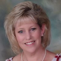 At Home Real Estate Employee Donna Baker's profile photo