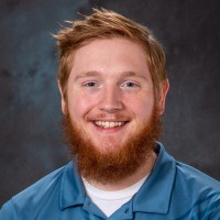 QLI Employee Mikey Love's profile photo
