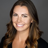 FIG. 1 Employee Tessa Alcock's profile photo