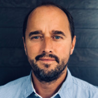 Surveil Employee Neil May's profile photo