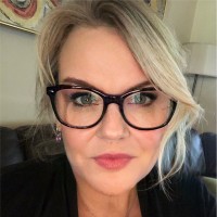 TravelCAST Consulting Employee Kim Castro's profile photo