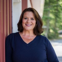 Touching Clients Employee April Woodcock's profile photo