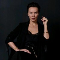 VC on the couch Employee Renata George's profile photo