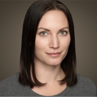 FIG. 1 Employee Roxanne Warren's profile photo