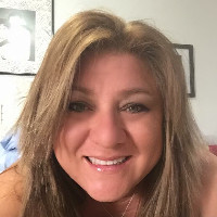 Travelers Club luggage Employee Gina Clancy's profile photo
