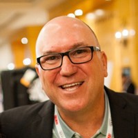 elevate. Employee John Flood's profile photo