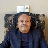 Alpaca Peruvian Charcoal Chicken Employee Sanjay Patel's profile photo