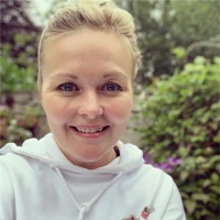 Orange & Gray Employee Emma Blake's profile photo