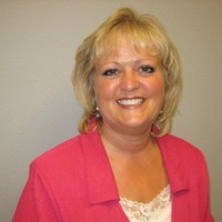 At Home Real Estate Employee Karen Mathers's profile photo