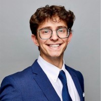 Suited Employee Tyler Cramer's profile photo