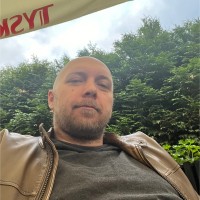 AI-Tech Employee Szymon Romaniec's profile photo