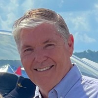 LLM Controls Employee Ken Burrows's profile photo