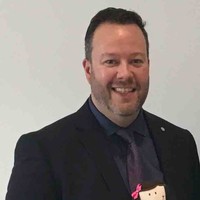 IA groupe financier Employee Christopher Grove's profile photo