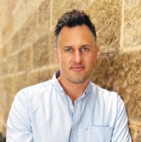 Superhero Employee Tim Johnson's profile photo