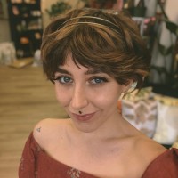 oak. Employee Mia Mulinaro's profile photo