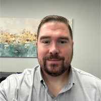 Universal ComOne Employee Adam Cressionnie's profile photo