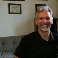 Mark E. Otero