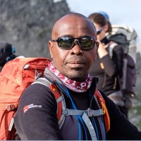 Bergfreunde Employee Christian Nkulikiyinka's profile photo