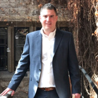 Beside Group Employee Andy Wilson's profile photo