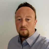 NUEOS Employee Adrian Land's profile photo
