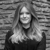 On Employee Britt Olsen's profile photo