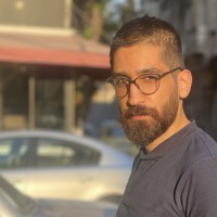 Ouis Nasli Email