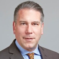 Ex: PricewaterhouseCoopers Employee David Schmid's profile photo