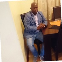 Group Technology Employee Reggie Tladi's profile photo