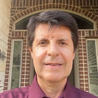 Realm Real Estate Professionals Employee Claudio Andrade's profile photo