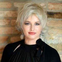 Daniela Comi Email