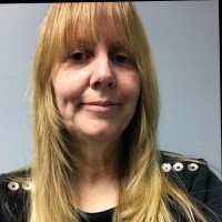 Doxim Employee Juli Yates's profile photo
