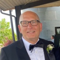 Red Paper Plane Employee Ken Stokes's profile photo
