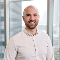With Intelligence Employee Henry Coombs's profile photo