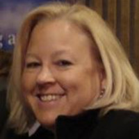 Community House Employee Patti Schmidt-Ruiz's profile photo