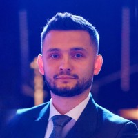 Krystian Tomala Email