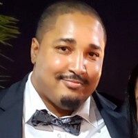 American Customer Care Employee Romaine Jarrett's profile photo