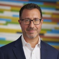 Travis Grundke Email & Phone Number