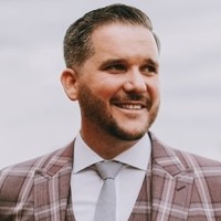 Button up Management Employee Tom Park's profile photo